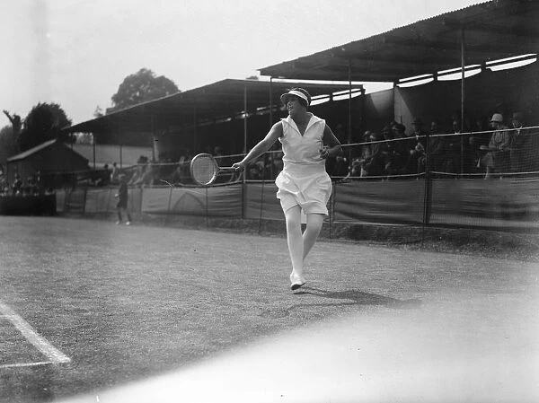 Surrey tennis championships at Surbiton. Miss Peggy Saunders in play. 19 May 1927