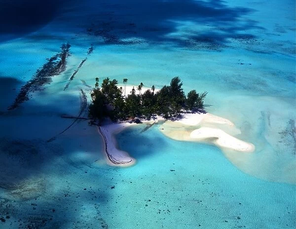 T4. 025. Polynesia. Bora Bora. Aerial view of small island off Bora Bora