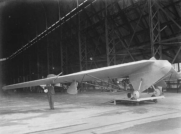 The tail less aeroplane, designed by Capt G T R Hill. The tail less aeroplane in its hangar