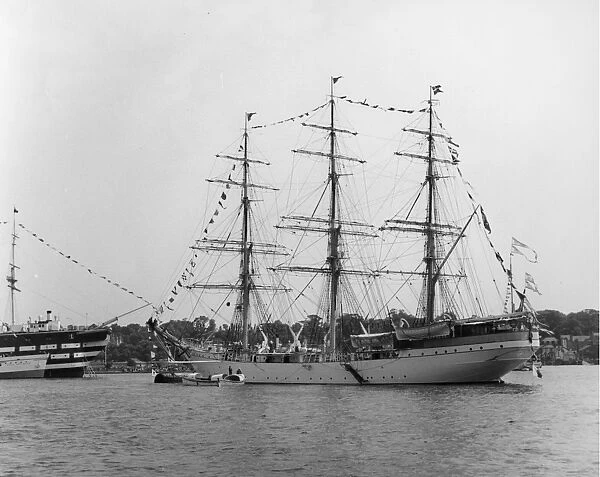 Tall ship moored next to HMS Worcester on the River Thames off Greenhithe, Kent. 20