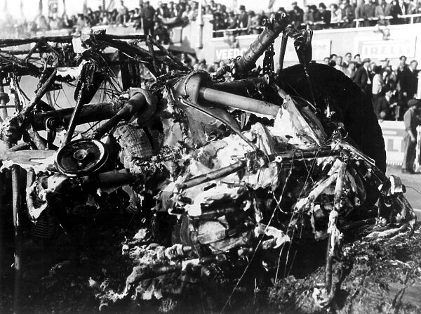 The tangled wreckage of Pierre Leveghs Mercedes after the disaster which claimed