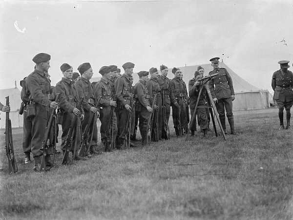 Territorial Army recruits at camp in Chichester, Sussex. Inspection of rifle shooting
