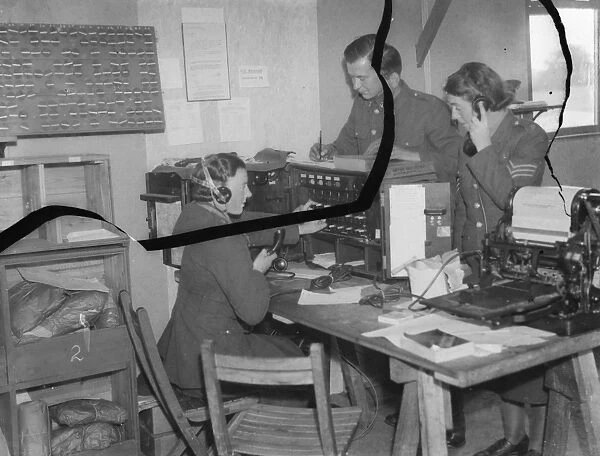 Territorial Army recruits at camp in Chichester, Sussex. The telephone operating room