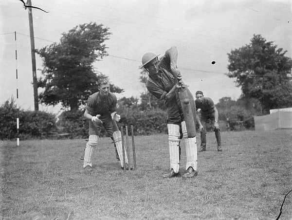 Territorial Army recruits at camp in Chichester, Sussex. A game of cricket. 1939