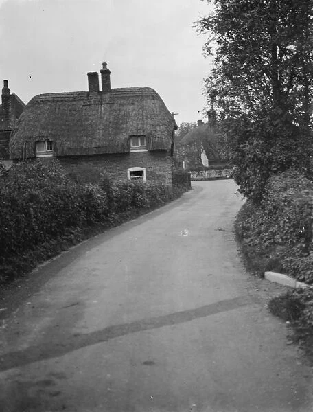 A thatched cottage at Womenswold village near Canterbury, Kent. 1937
