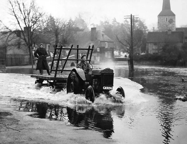 Only tractors could get through the floods at Eynsford, Kent, when the river Darent