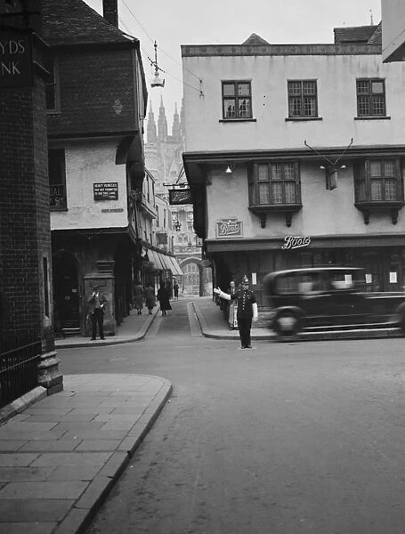 A traffic policeman on duty in Canterbury High Street, Kent. 1937