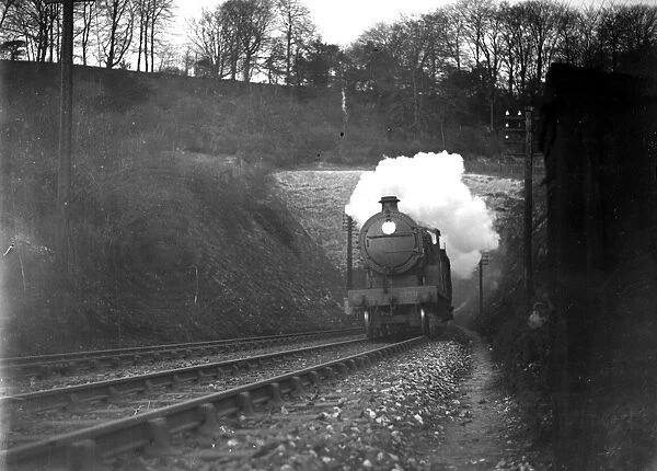 Train emerging from a tunnel. 1934