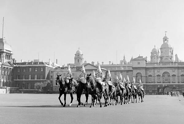 A troop of horseguards outside Horse Guards Parade, Whitehall, London, England