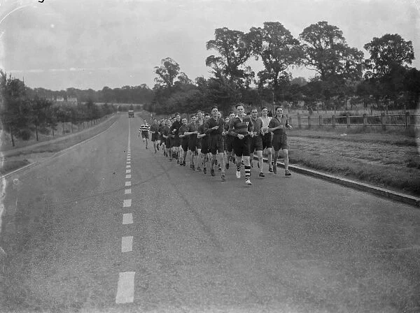 Troops on a training cross country run in North Kent. 1939
