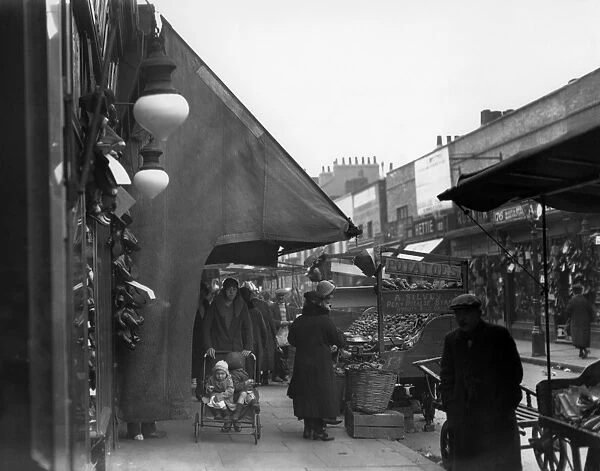 Typical street market scene in Lambeth Walk, London - 1932 A TopFoto