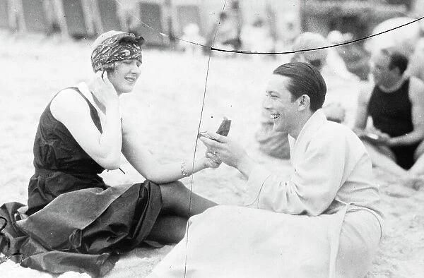 Vanity Fair Jack Pickford, the film star, holds his wifes vanity case up to