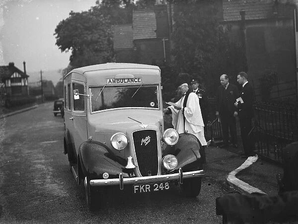 The vicar of Farningham, Kent, dedicates a St Johns Ambulance. 1939