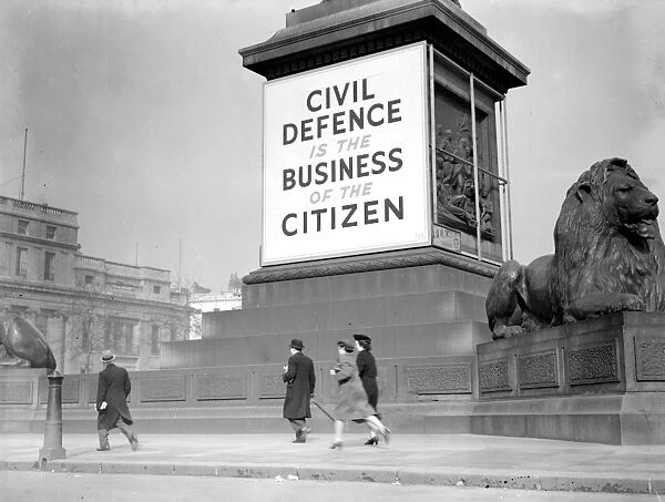 War Crisis, 1939. Air Raid precautions Civil Defence poster in Trafalgar Square