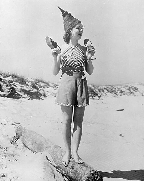 Warm weather brings nude beach fashion. A new summer beach fashion worn by Lorraine