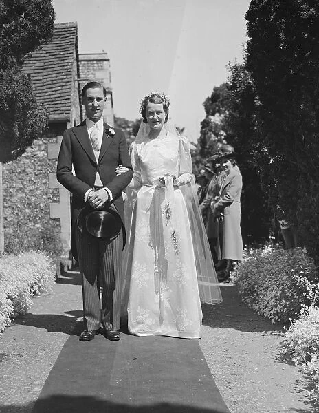 The wedding of Guy Farrr and Mary Stacey in Crayford, Kent. The bride and groom