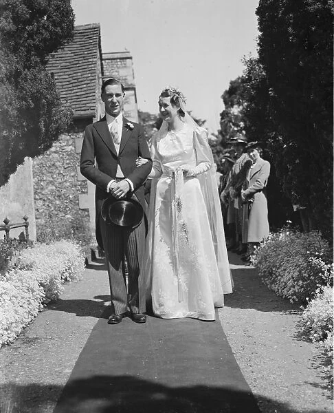 The wedding of Guy Farrr and Mary Stacey in Crayford, Kent. The bride and groom