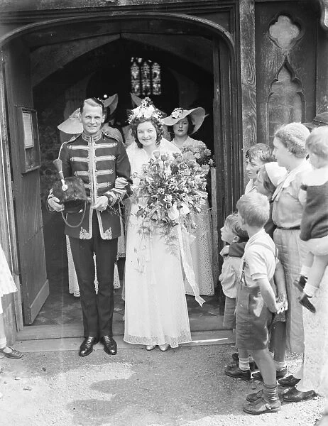 The wedding of Mr Archie Percival Laurie Batsom RA and Miss Iris Ivy Gwen Kemp. The bride