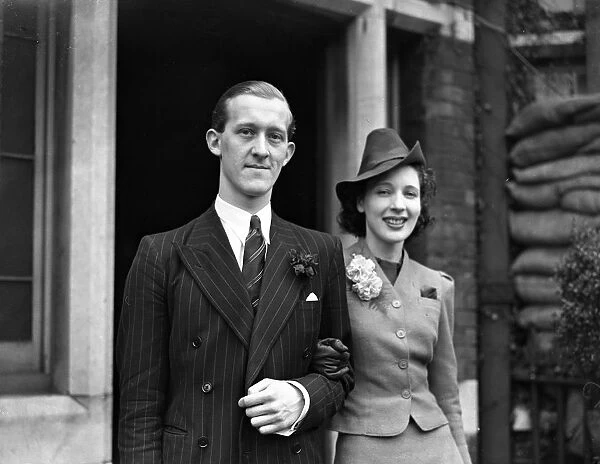 Wedding of Mr Donald J Dickman and Miss Betty N Swinhoe at Kensington Register Office, London