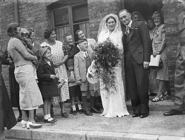 The wedding of Mr W Maitland and Miss R E Clark in Gravesend, Kent. The bride and groom