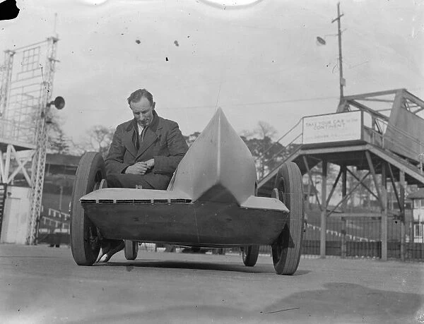 Weird car for Easter Monday racing at Brooklands. Mr H G Dobbs with his Riley