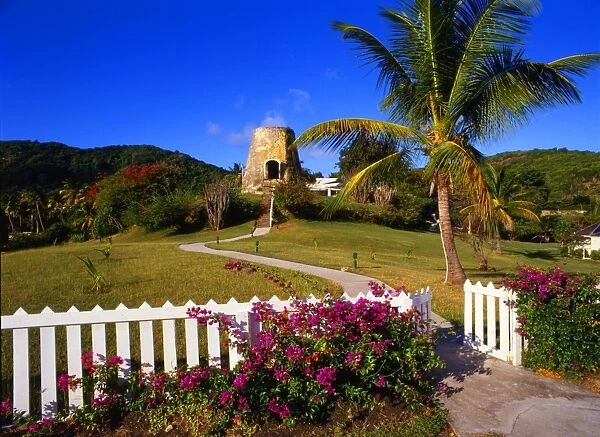 West Indies. Antigua. Converted sugar mill, above Hawksbill bay