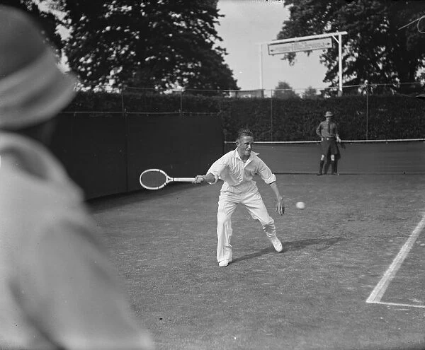 Wimbledon lawn tennis Championships. Wilbur Coen ( USA ) in play against Axel Petersen