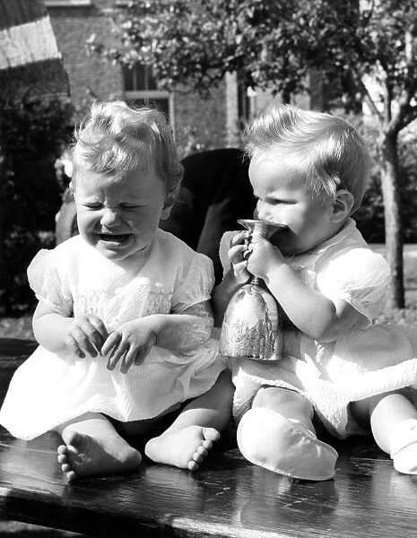 Winner of the hospital fete baby show - 9 month old Leonard Goldsmith (right)