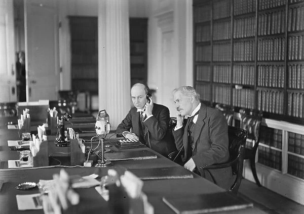 Wireless phone service to Australia. Mr Ramsay MacDonald sitting in the Cabinet