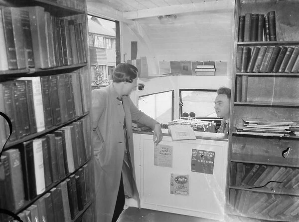 A woman visiting the Kent County mobile library. 1939