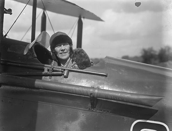 More women learning to fly. London pupils who show skill and coolness at Stag Lane Aerodrome