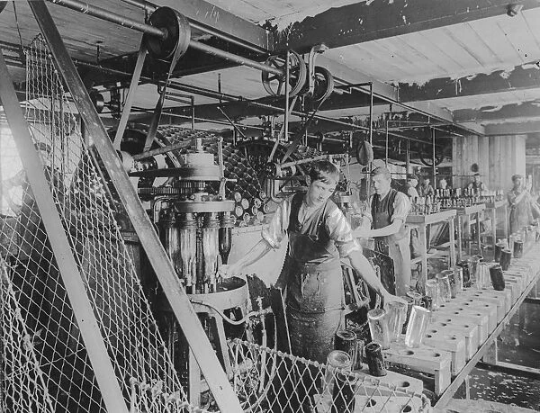 Workers bottle washing in a brewery London, England. undated