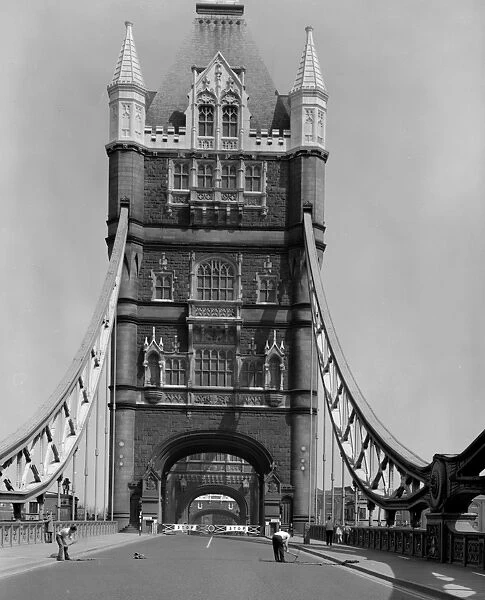 Workmen on Tower Bridge, London, England, UK. 1960 s