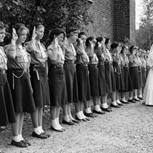 The 3rd Swanley Girl Guides form a Guard of Honour at St Marys Church as the bride