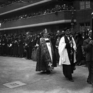 The Archbishop of Canterbury in procession at the opening of the new block of flats