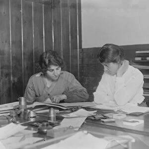 Atalanta works, Loughborough, run by women Miss Turner and Mrs Ashberry examining