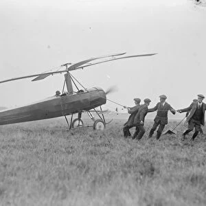 The autogiro demonstrated at Farnborough. Starting the machine. 19 October 1925
