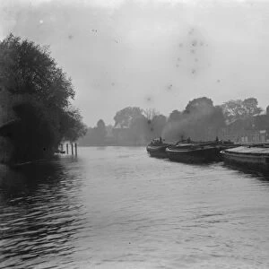 Barges on the river Thames near Richmond upon Thames. 1936