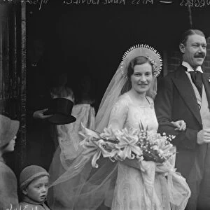 Beautiful brides striking head dress. The marriage of Miss Ann Bovill and Mr C P A Burgess
