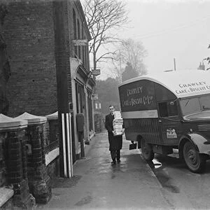 A Bedford van from the Crawley Cake and Biscuit Co Ltd from Crawley, Sussex, making