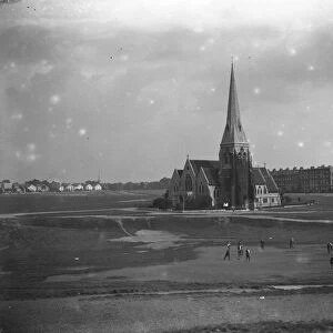 Blackheath, London, showing the Heath and All Saints Church with a cricket match