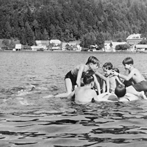 Boy king of Yugoslavia joins in the fun of camp life. King Peter, the boy monarch of Yugoslavia