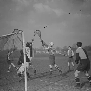 Boys playing Lacrosse at Sidcup County School, Kent. 12 February 1938