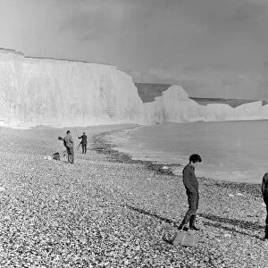 Boys sea fishing at Seven Sisters, Birling Gap, Sussex, England. 1960 s