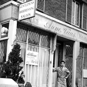Brian Wells standing infront of his Barber Shop in London Road Westerham Kent. Twice