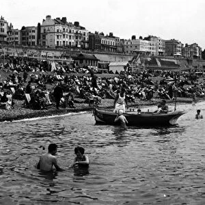 Brighton Crowded beaches and boat 1 August 1954