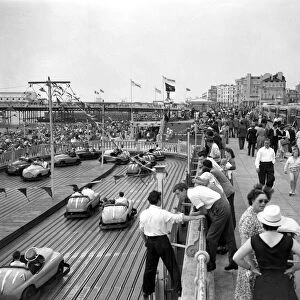 Brighton The Promenade looking west, showing a section of Palace Pier and the dodgem car track