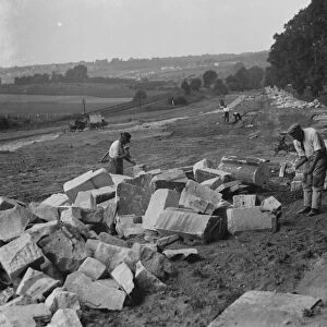 Building up wall with stone of Waterloo Bridge. St Mary Cray. 1937