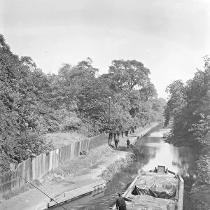 A canal barge on the Southern Blackwall Canal from the Vokins Company Ltd. undated