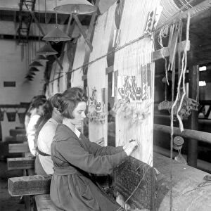 Carpet making at Wilton. Weaving a handmade real Axminster carpet. 1 November 1920